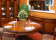 Traditional dining room with matching china hutch and place settings